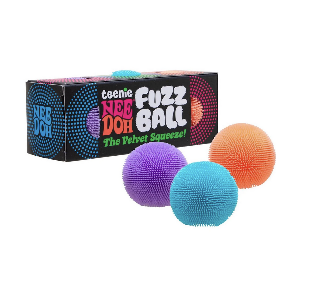 Purple, blue and orange textured Teenie NeeDoh Fuzz Balls set in front of the black box with colorful dots decorating the front of it. 