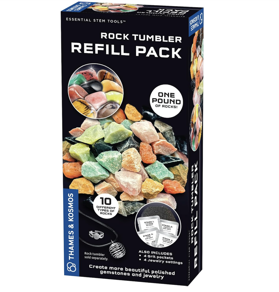 Rock Tumbler Refill Pack packaged in a black box featuring a picture of 1 pound of rough rocks that are included with the jewelry settings, and different types of grit packets. 