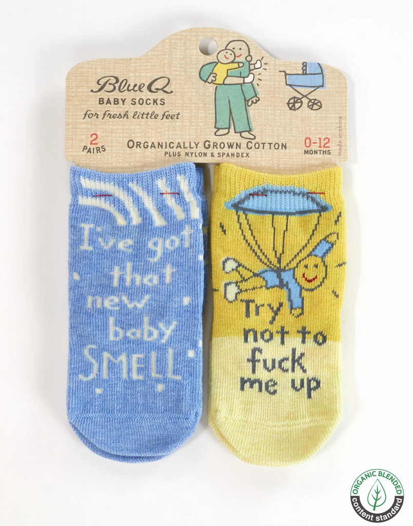 Baby sock set with a blue pair the reads "I've got that new baby smell" and the second pair is two toned 
yellow that read "Try not to fuck me up" 