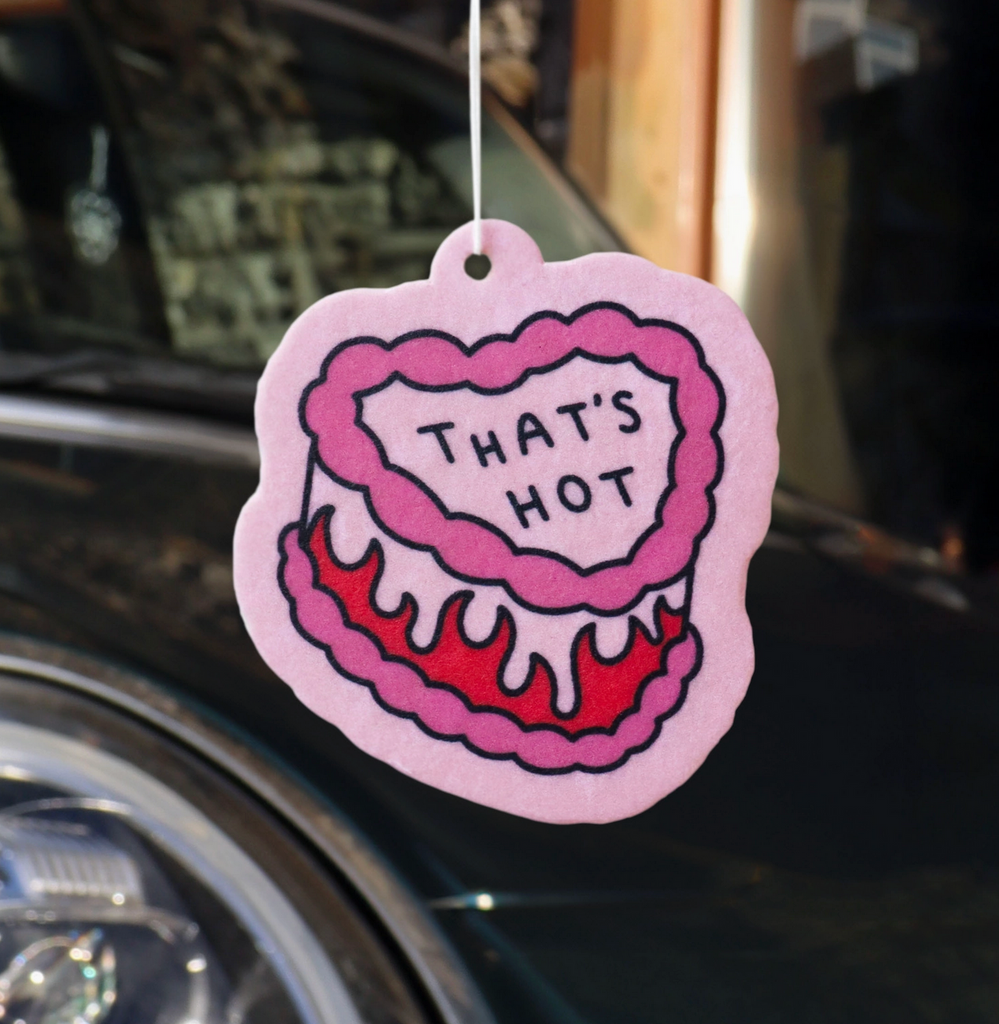 "That's Hot heart shaped cake air freshener hanging inside a car. 