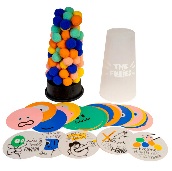 All the components of The Fuzzies game.  Playing cards, fuzzie balls, and a cup to store everything in. 