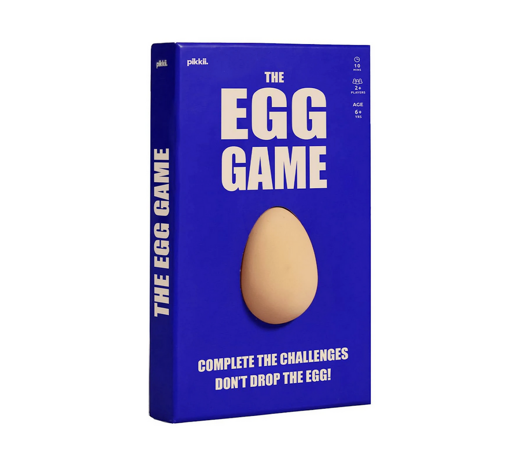 Bright blue box with off white lettering that reads The Egg Game with a cutout in the front so you can feel the fake egg included with the game to complete the challenges. 