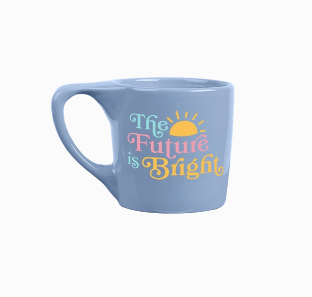 Light blue colored mug with "The Future is Bright" wiritten on it and a sun. 