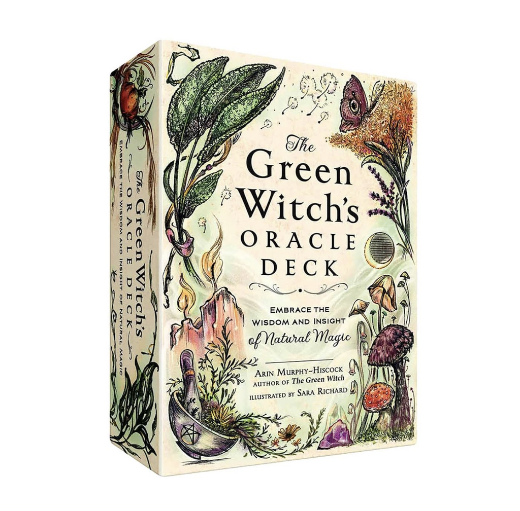 The Green Witch's Oracle Deck packaged in a box with lovely illustrations of plants, flowers, and other items from nature used in natural magic. 