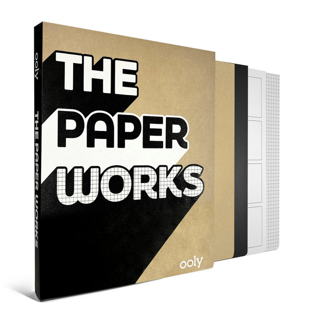 The Paper Works sketchbook with a cover that reflects the different papers included inside, black, kraft, grid, an comic strip templates. 