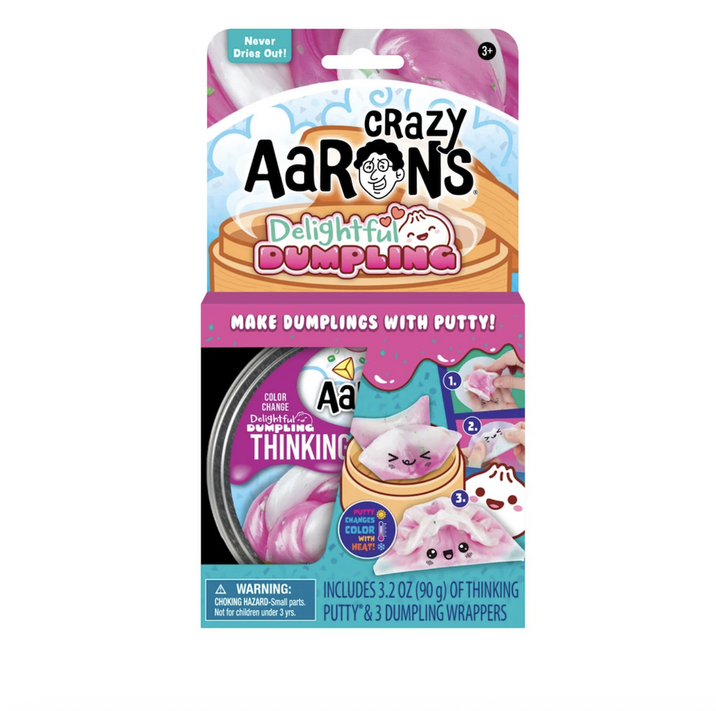 Crazy Aaron's Delightful Dumpling Thinking Putty tin packaged in an open box with illustrations of kawaii style dumplings on a steamer basket. 