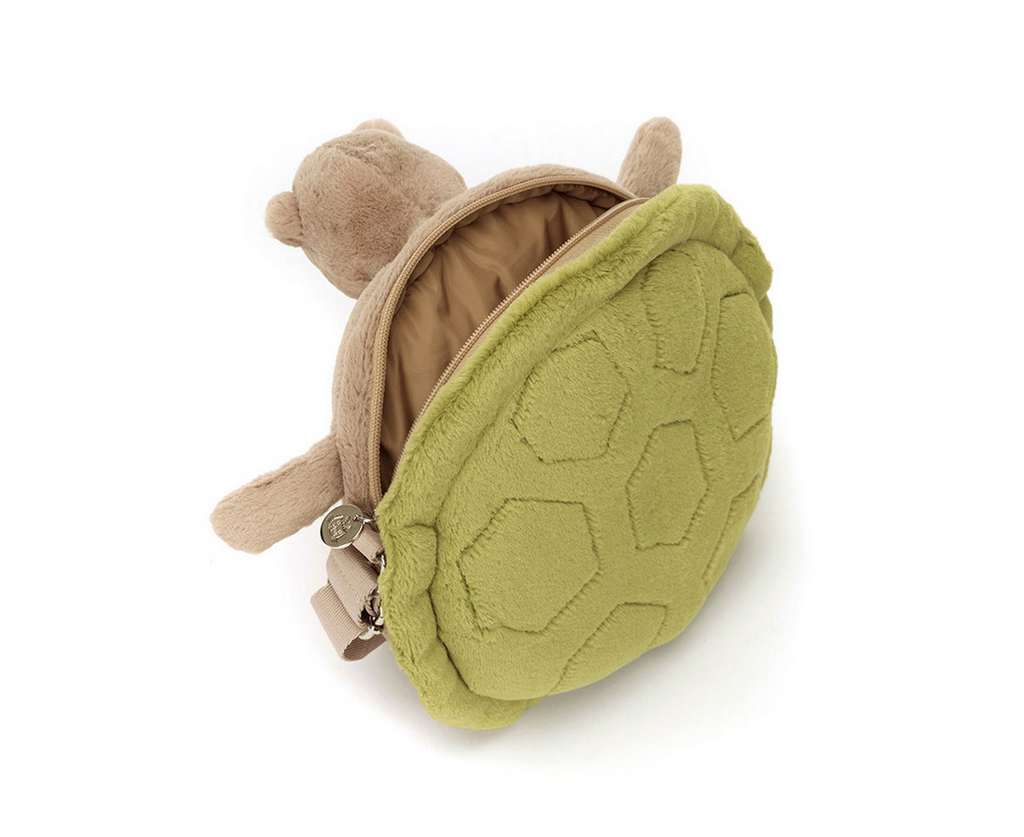 Back view of plush turtle bag with opened zipper.