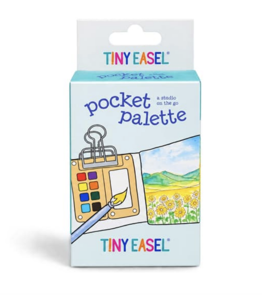 The Pocket Pa;ette from Tiny Easel packaged in a little box with an illustration of a field of flowers being painted with the mini watercolor palette. 