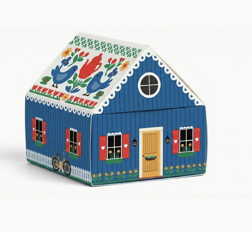 The Tiny Living Blue Matchbox Cottage which is a box decorated like the most adorable cottage with flowers and birds decorating it. 
