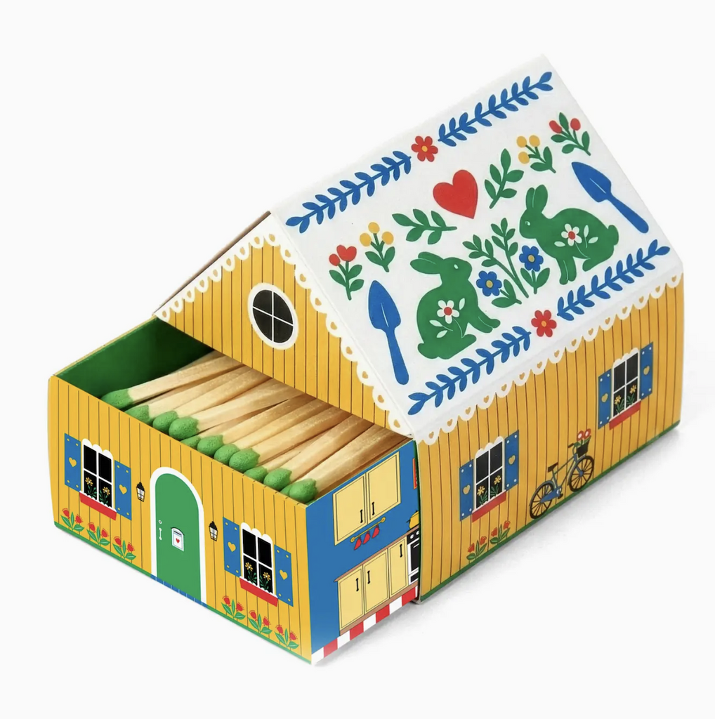 The Tiny Living Yellow Matchbox Cottage with the little drawer opened to show the green tipped wooden matches inside. 