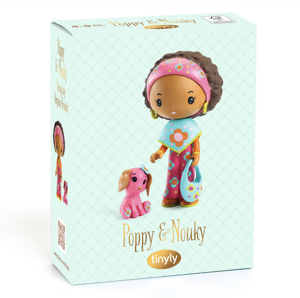 Blue patterned box with a picture of Poppy wearing her groovy poncho with her best friend Nouky by her side pictured on the front. 