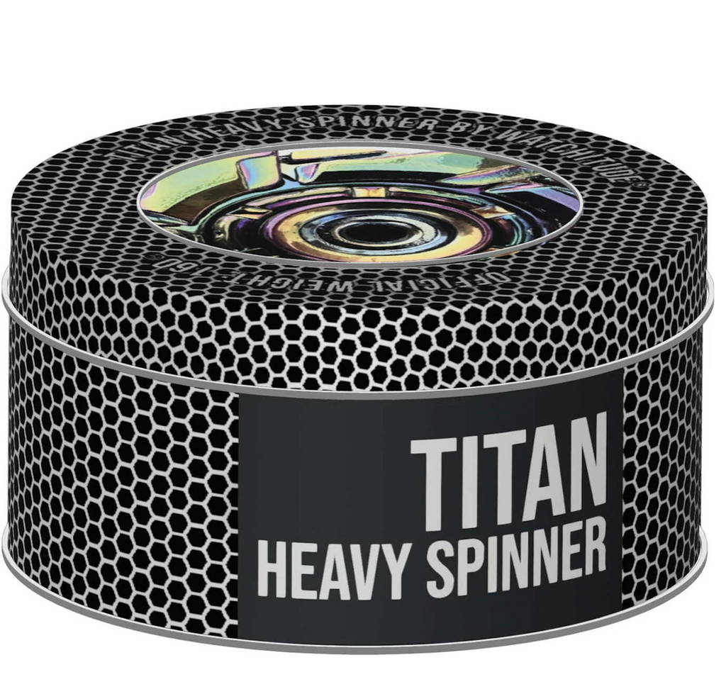 The Titan Heavy Soinner packaged in a circular tin with black and silver gear pattern. 