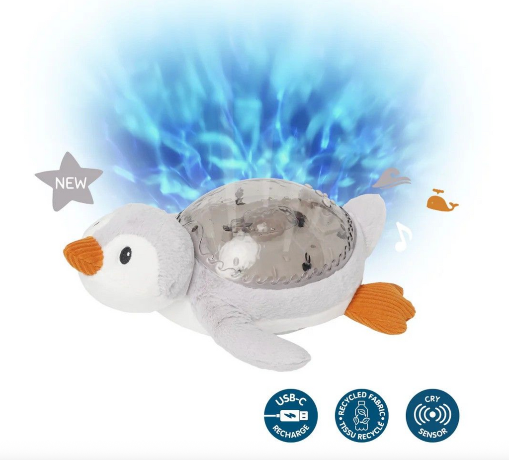 Plush Tranquil Penguin with water projection on the ceiling and three badges stating "USB-C Recharge" "Recycled Fabric" and "Cry Sensor" 