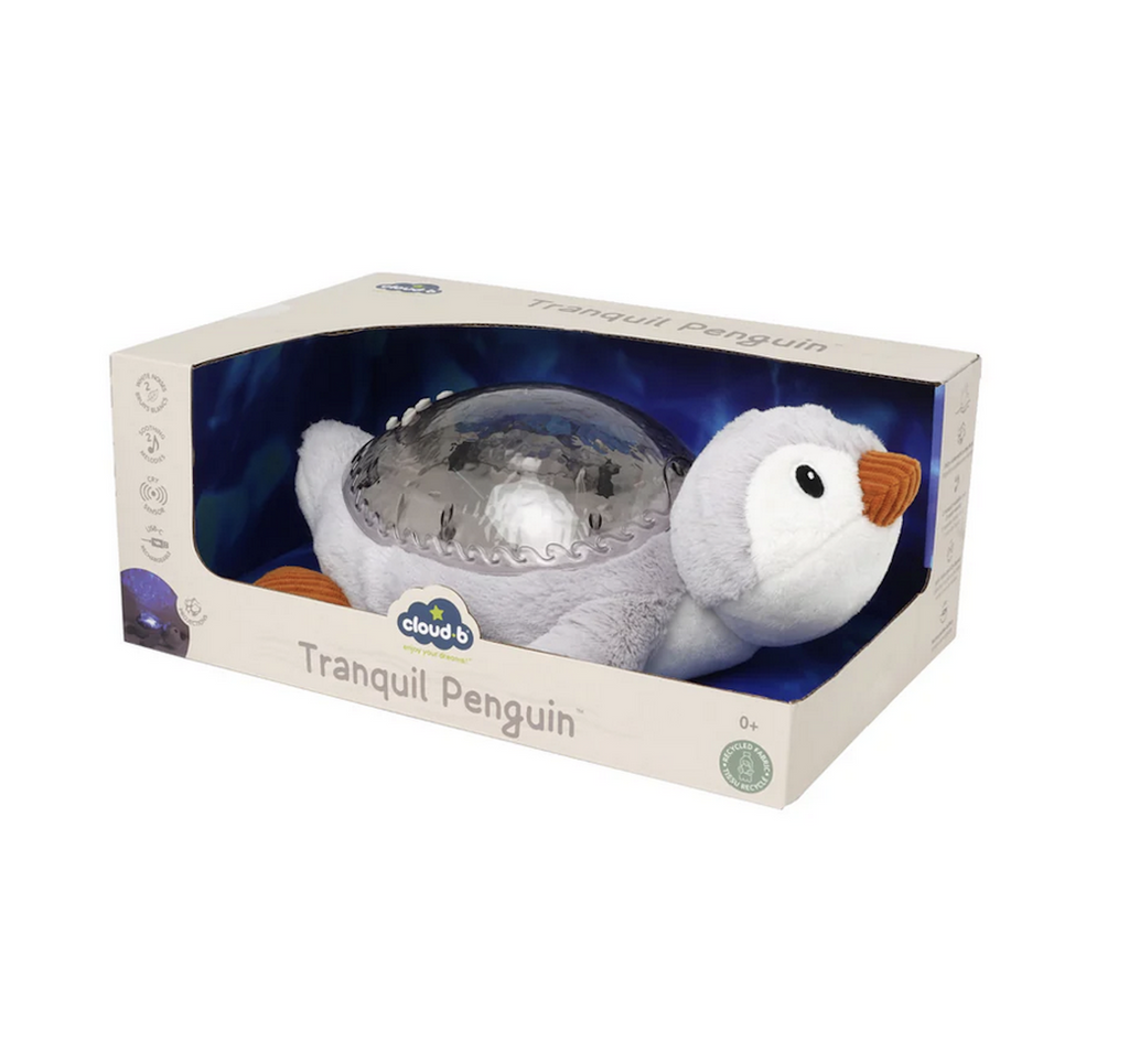 The Tranquil Penguin in an open box so that the soft plush of the penguin can be felt and the soothing sounds and nightlight can be sampled. 