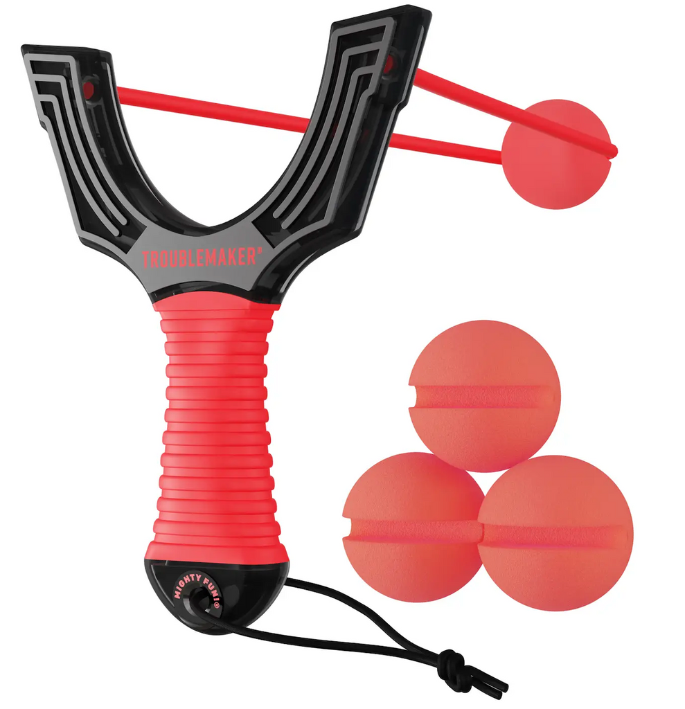 Red and black Trouble Maker Slingshot with three red foam balls and one loaded in the sling. 