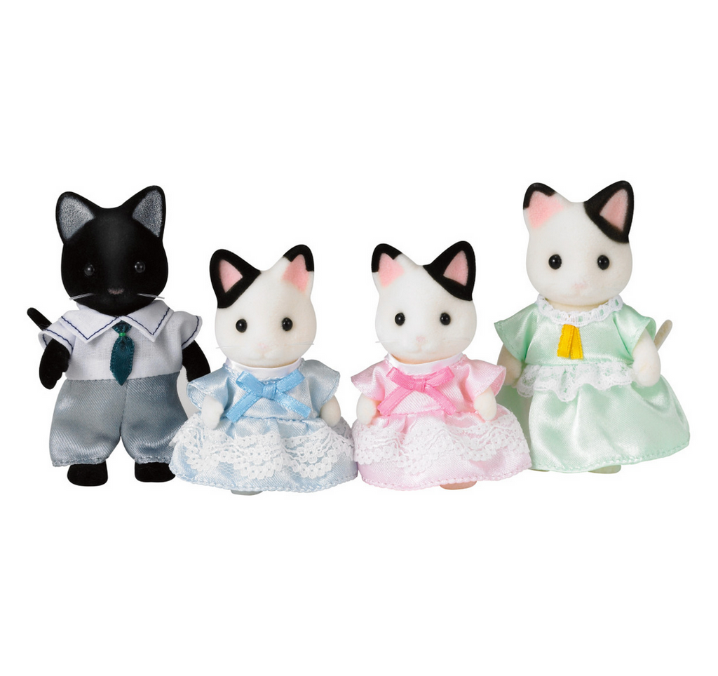 Mother, Father, and twin Calico Critters Tuxedo Cat Family figures.