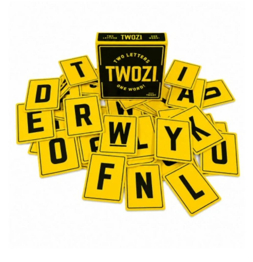 Bright yellow cards with black letters scattered all around the Twozi box. 