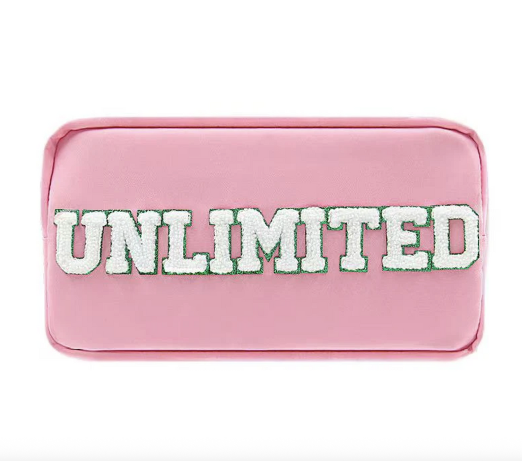 Rectangle shaped pink, nylon cosmetic bag with the word "UNLIMITED" in white chenille letters on the side. 