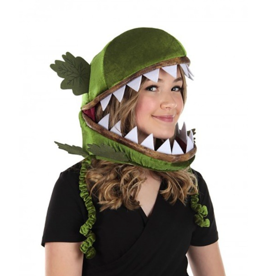 Venus Flytrap Jawsome Hat is 100% polyester fabric and 100% polyurethane foam. It has a green velour outer shell, Felt leaves & teeth sewn to outer shell. Shown here being worn by an adult. 