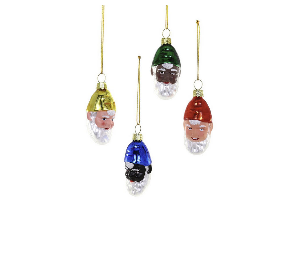 Multi ethnic glass gnome head ornaments.