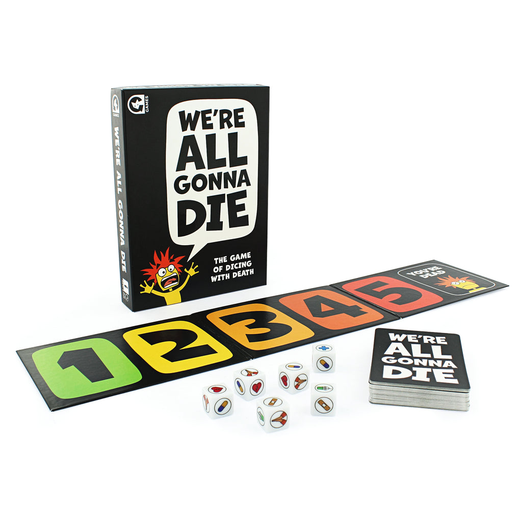 We're All Gonna Die game box with compnents of the game in the foreground. DIce, game cards and a numbered board. 