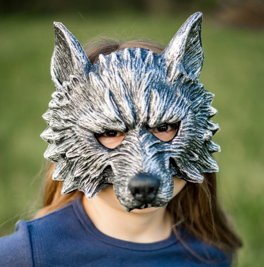 This black and silver foam rubber werewolf mask is incredibly realistic and high-quality. The mask is made with openings for the eyes, nose, and mouth, ensuring optimal visibility and breathability. Shown here on a childs face and it fits over the forehead and ends just before chin level. 