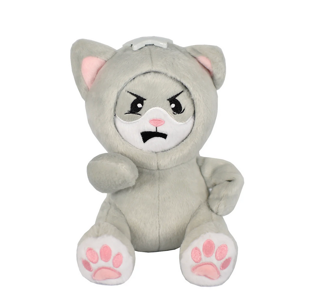 Whatsisface grey kitty cat in a seated pose wearing an angry expression on it's face. 