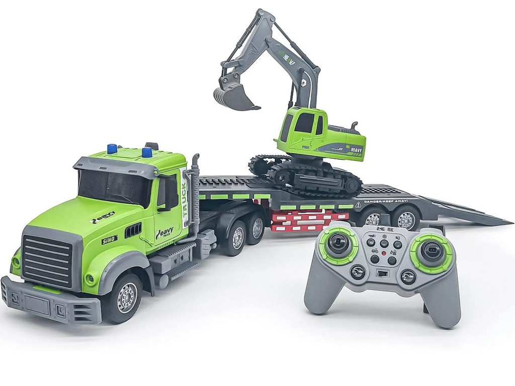 The green and grey big rig flatbed hauler with the excavator loaded up remote control vehicles. 