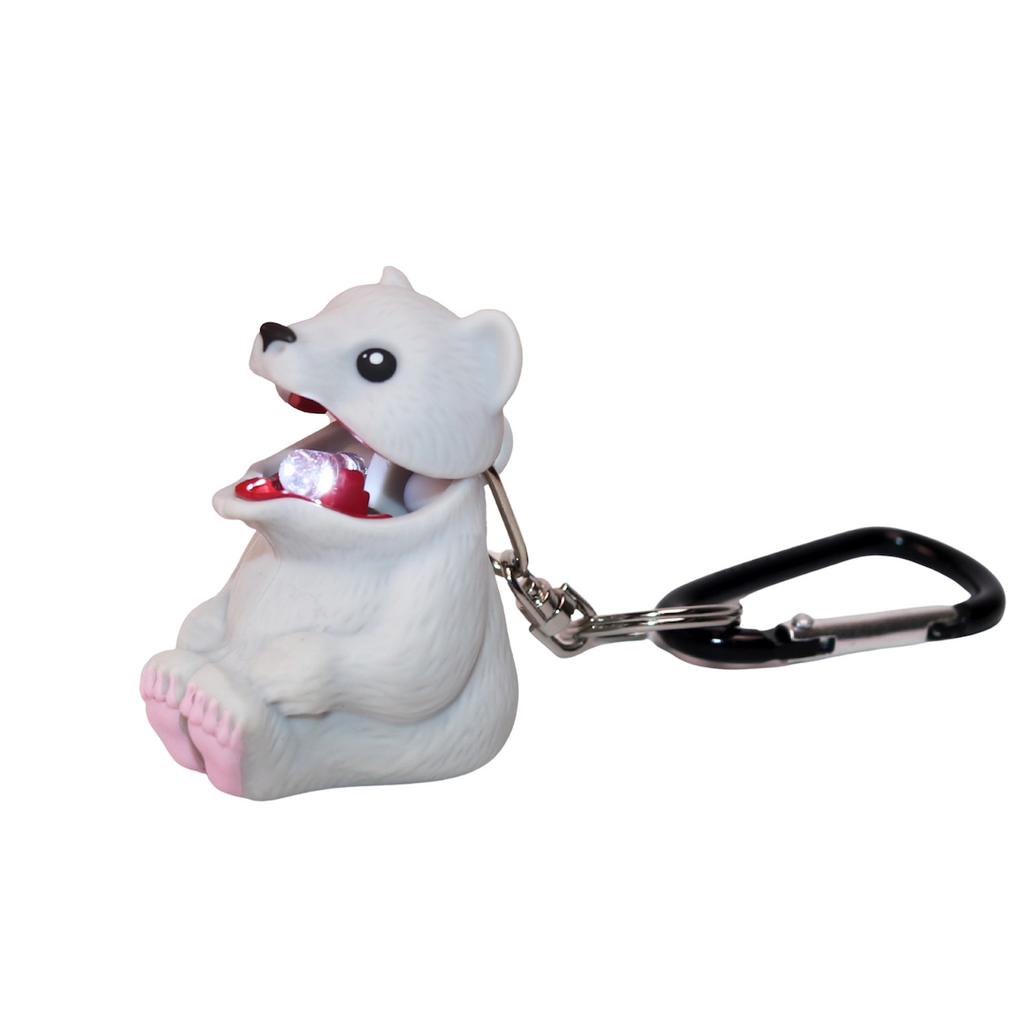 White Polar Bear attached to a carabiner with it's mouth open and the bright LED light shining. 