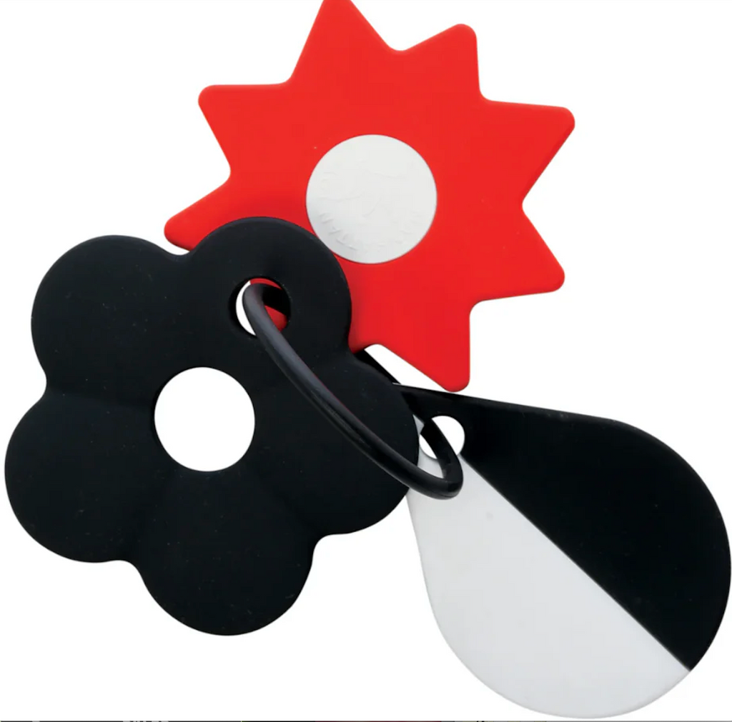 Three shapes attached to a ring that baby can explore colors, textures and use a s a teether. There is a red sun, black flower shape and black and white teardrop shape.