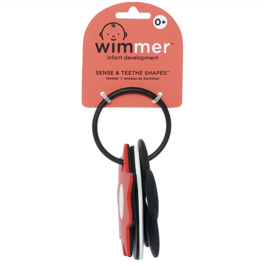 The Wimmer Sense and Explore Shapes hanging on a black ring and packaged on a hang card. 