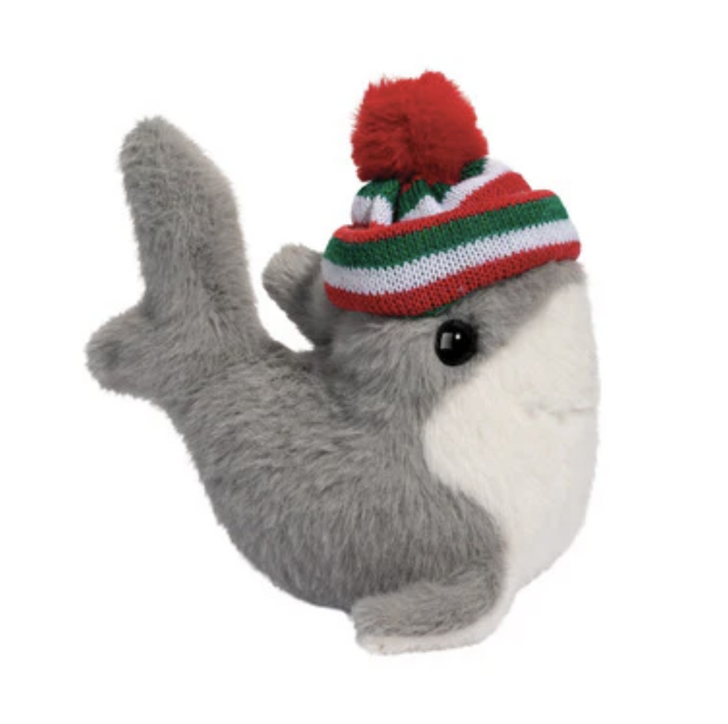Mini plush shark wearing a red, white and green winter hat. 