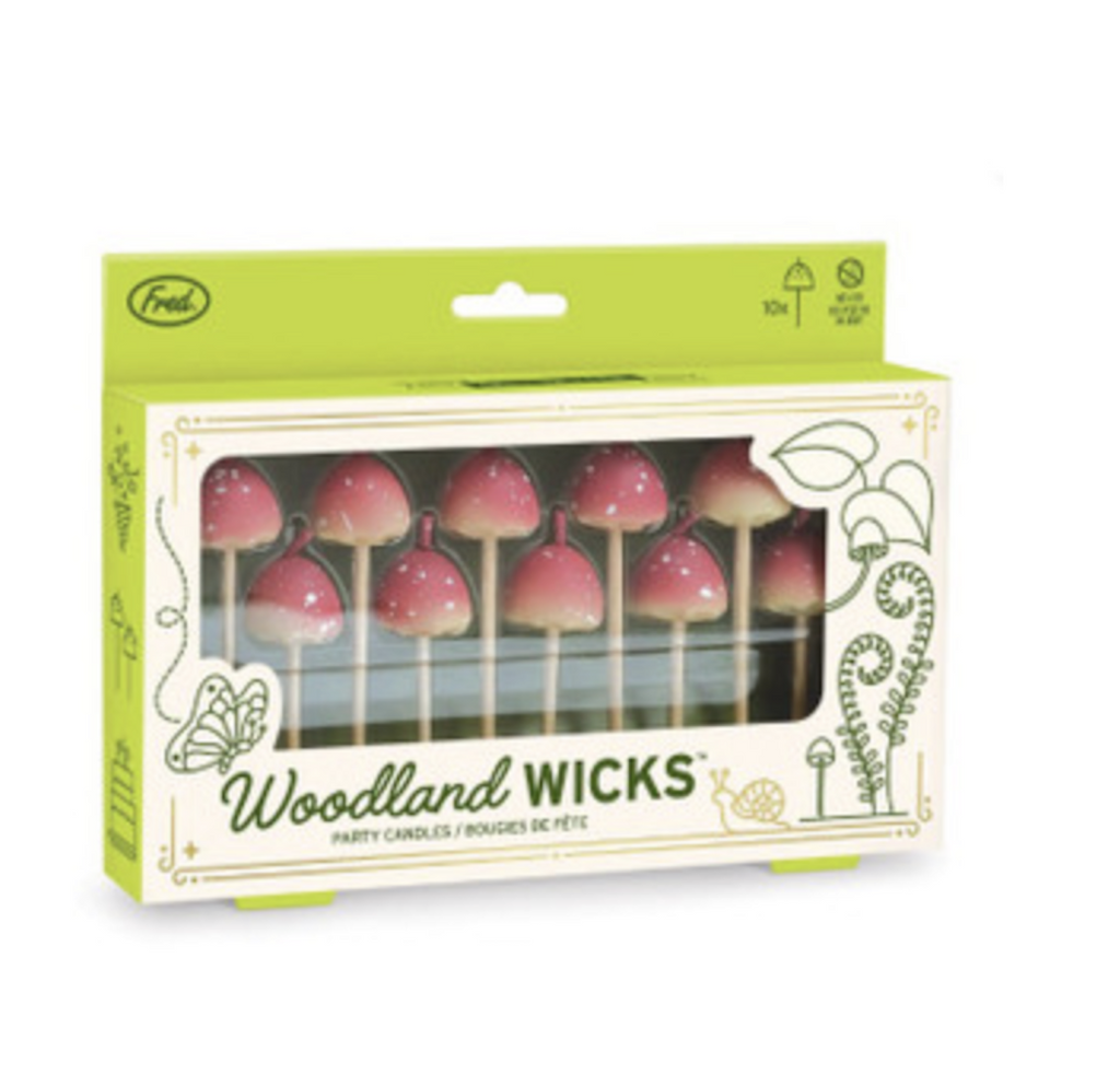 Box with clear plastic window showing the Woodland Mushroom candles. 
