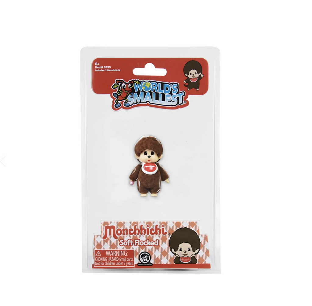 The World's Smallest Monchhichi in a clear plastic package. 