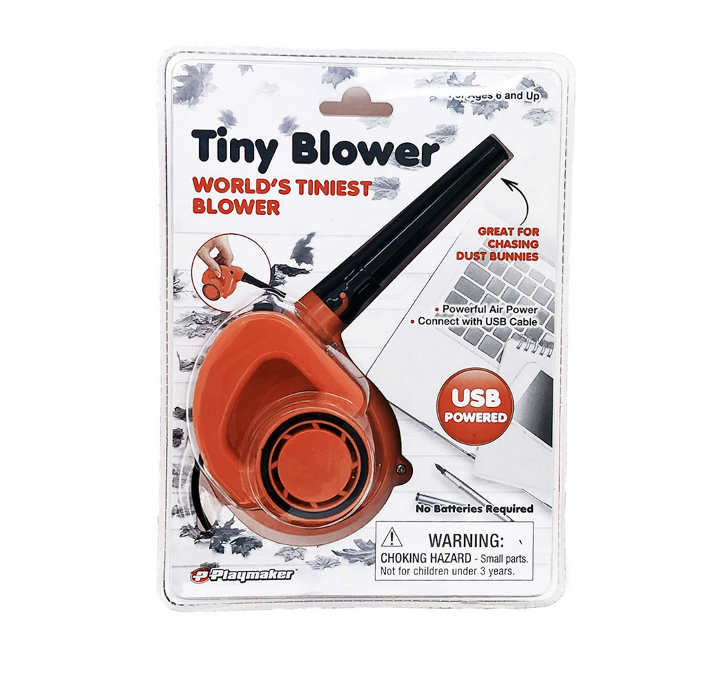 World's Tiniest Blower packaged in clear plastic with graphics of leaves and a keyboard to show the many uses of the miniature, orange blower. 