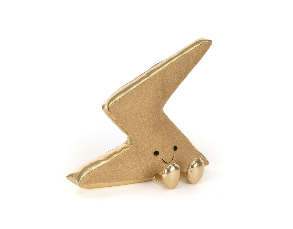 Shiny gold plush lightning bolt with a happy face and shiny legs on a white background.