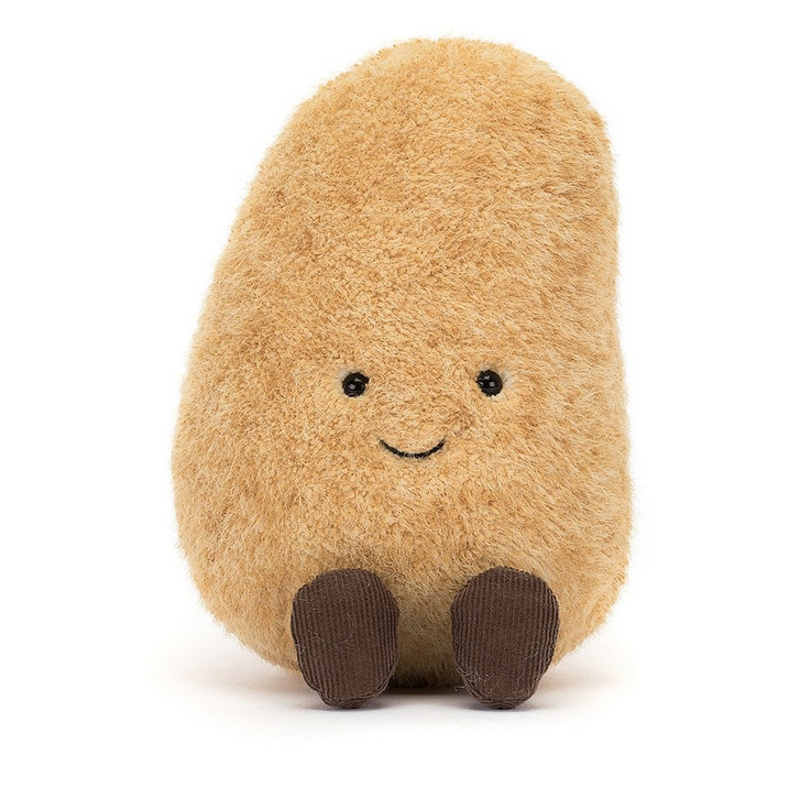Chunky, round plush light brown potato with cute grin and brown courduroy boots. 