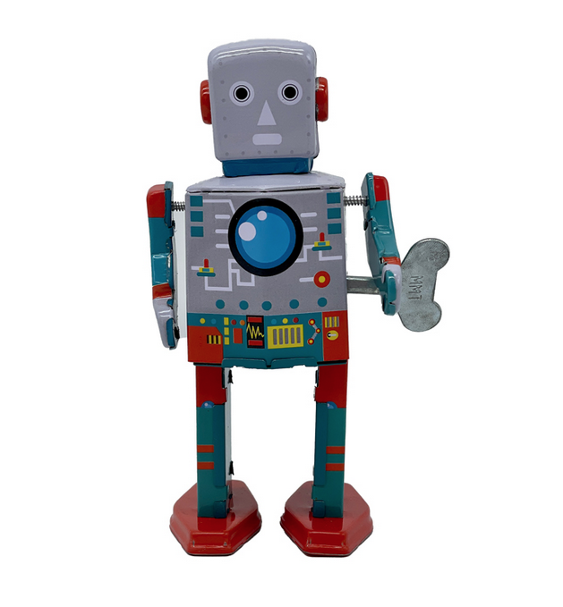 The Astronautbot facing front. He has the look of a classic robot with square head and body with blue and red components painted on his steel body. 