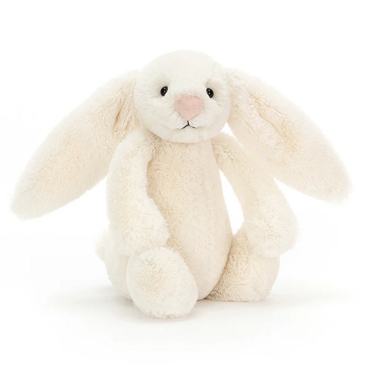 Forward facing Bashful Cream Bunny plush with light pink nose and long ears. 