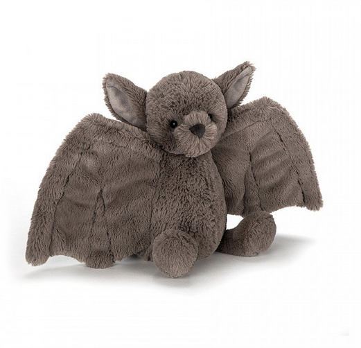 This fancy bat has suedey ears, bright, shiny eyes and stitched snub nose