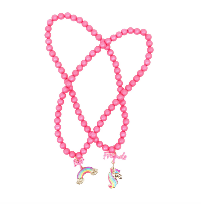 Pink beaded Best Friend necklaces. Best necklace has a rainbow charm, friends charm has a unicorn with a rainbow mane.