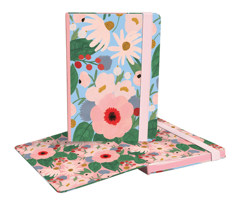 Big journal with drawings of oversized pink and white flowers.