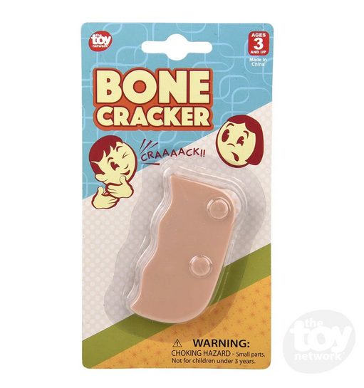Bone cracker trick in it's package on a hang card with retro graphics, 