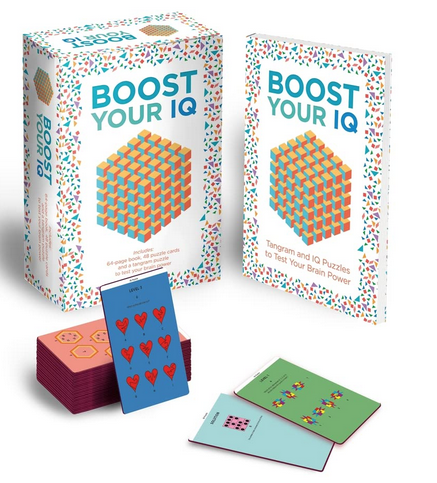 The box for Boost Your IQ kit. It is white with a confetti border with a 3d cube illustrated on it. There is also a selection of brain-boosting challenge cards in the foreground. 