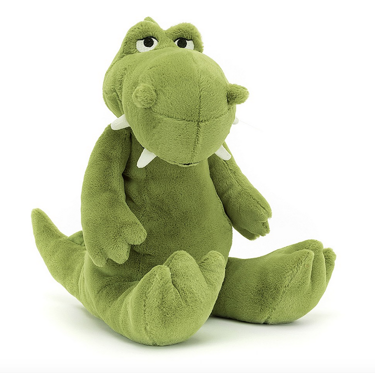 Bryno Dino is apple-green and has a bobbly brow, knobbled nostrils, suedette tusks and huge squashy feet, as well as a wedge tail embroidered with spines.