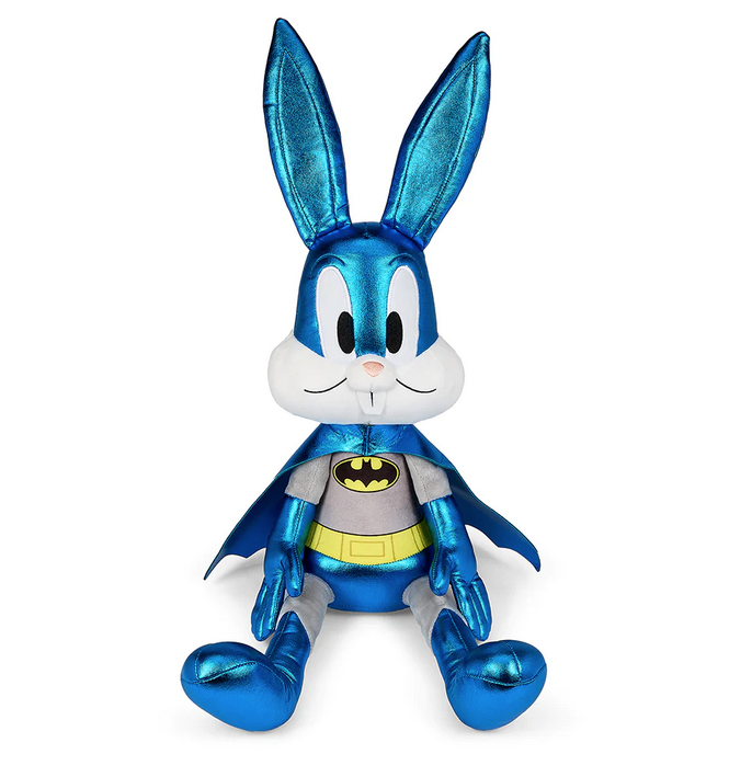 Plush Bugs Bunny wearing a grey Batman uniform with shiny blue lamé boots, gloves, cape and mask covering his ears. 