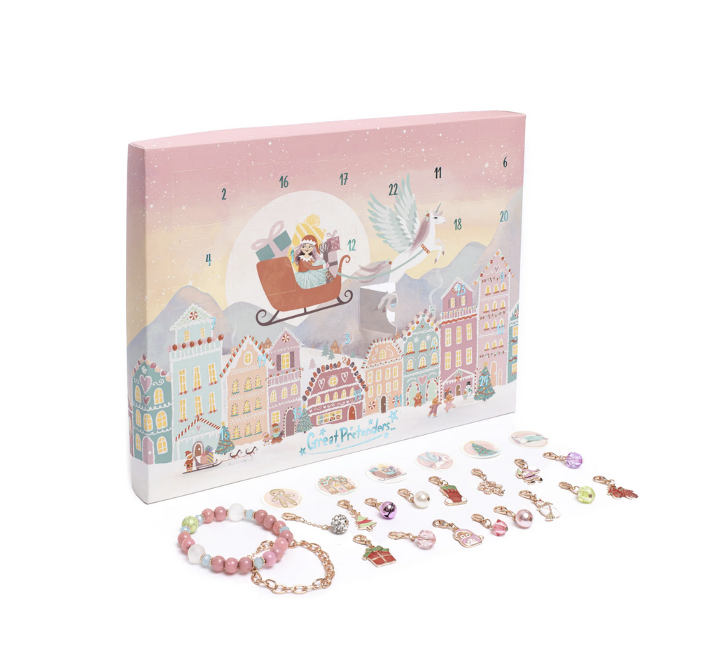 Build a Bracelet Advent Calendar. Count down to Christmas and build a charm bracelet.  Box has an illustration of a girl in a santa hat riding in a sleigh pulled by a unicorn over a holiday town scene.