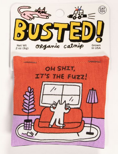 Fabric catnip toy with a drawing of a cat on a couch looking out the window. Text reads "Oh shit, it's the fuzz!"