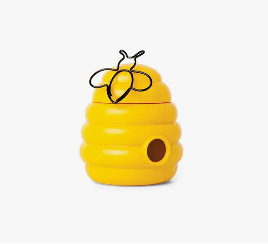 Busy Bees paper clip holder.  Looks like a beehive and is magnetic. It has a bee shaped paper clip stuck to it.
