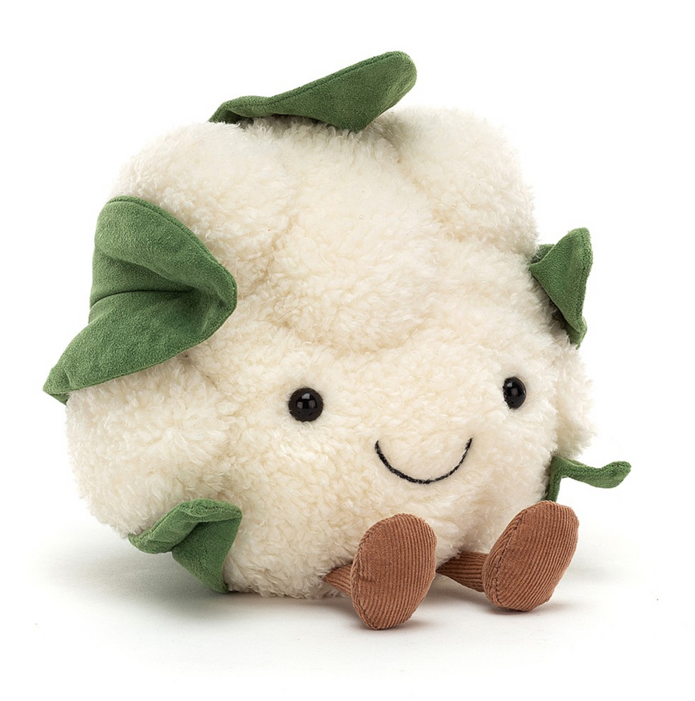 Plush white cauliflower with a happy face and brown feet.